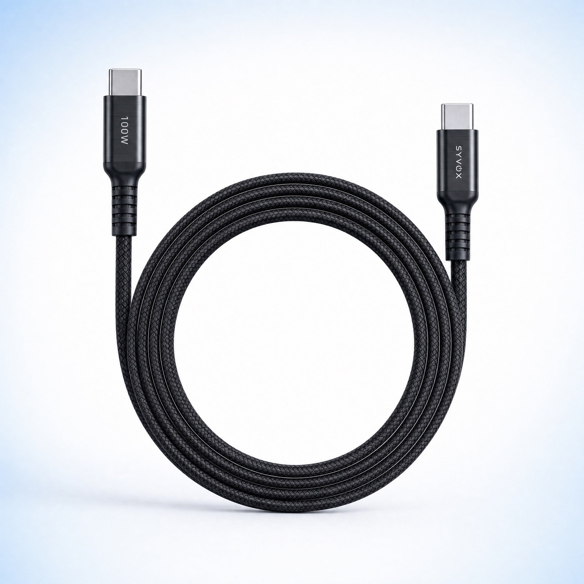 Essential-serie: opgerolde zwarte USB-C-kabel in blauw licht
